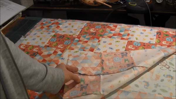 Beginner Quilt Series Quilt Backing Showing top and backing